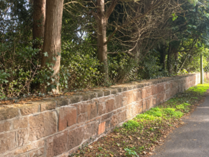 Before Sefton Wall Top Feather Edged Fence Installation